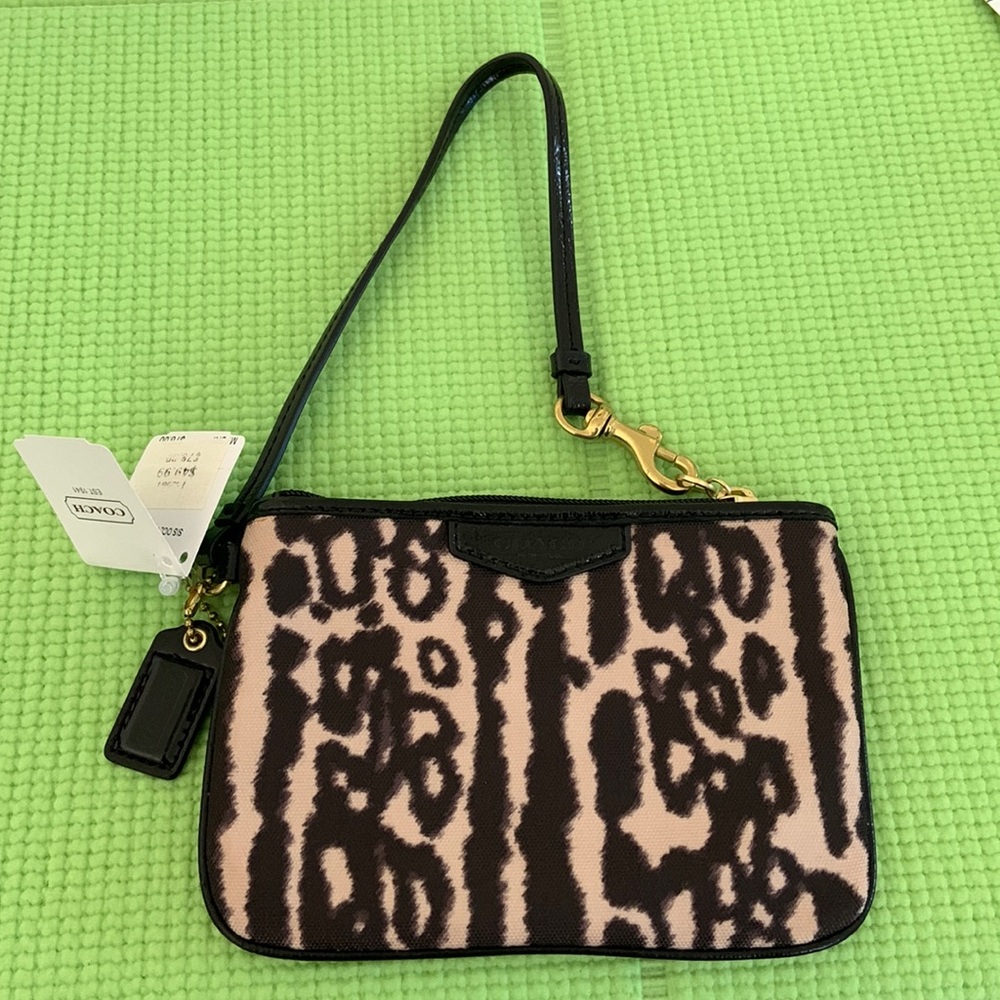 Coach printed wristlet.